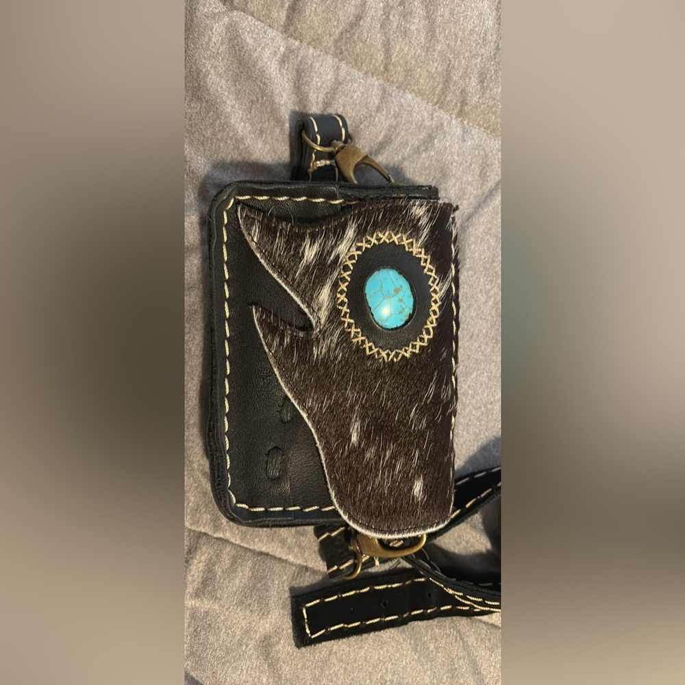 Black and Brown Leather Crossbody Bag with Turquoise Accent brand new.